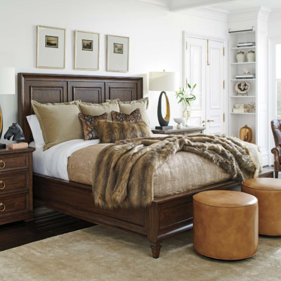 A bedroom featuring hues of chocolate and caramel